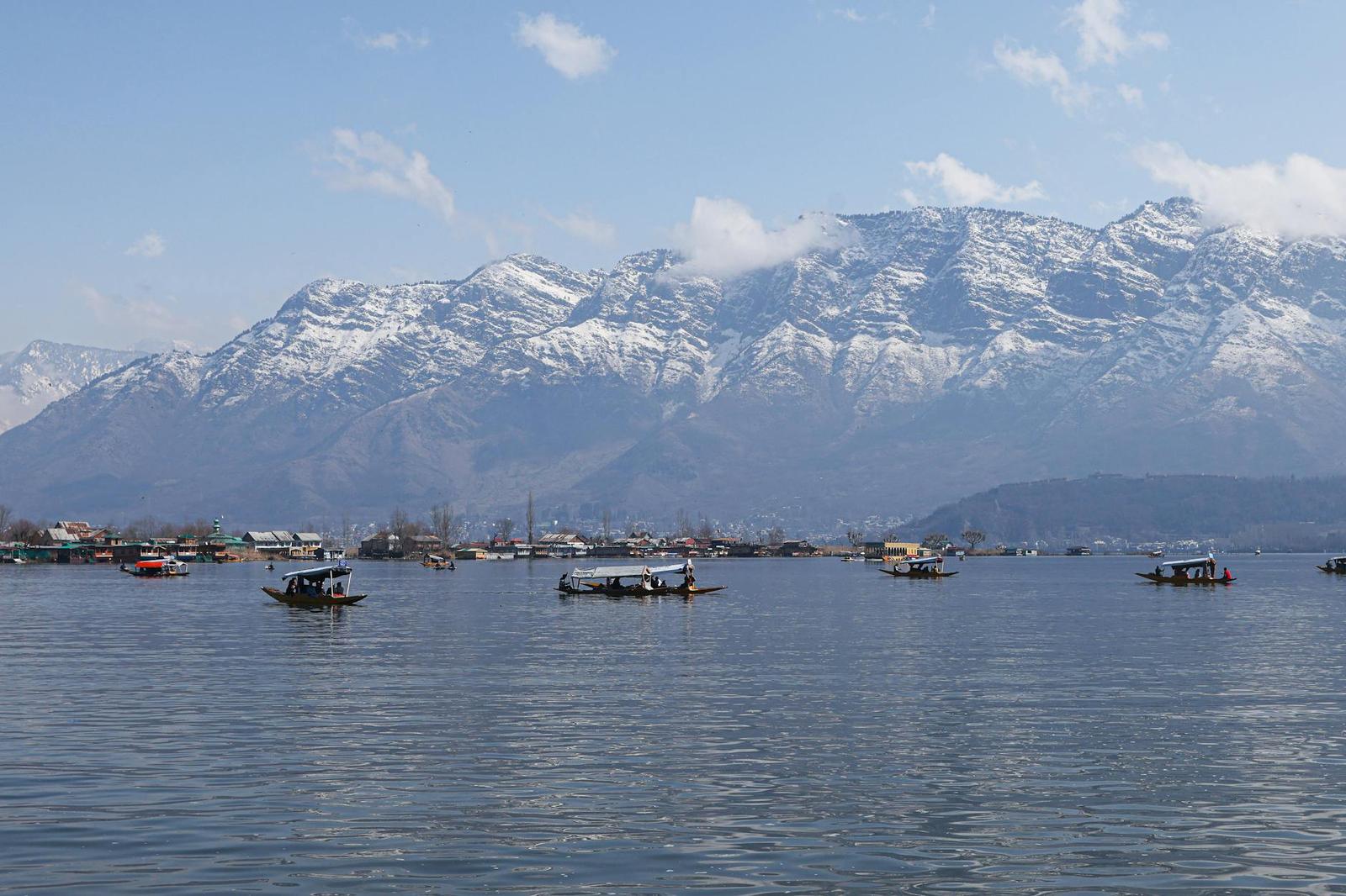 Shikara Ride On Snow-Dusted Dal Lake, India