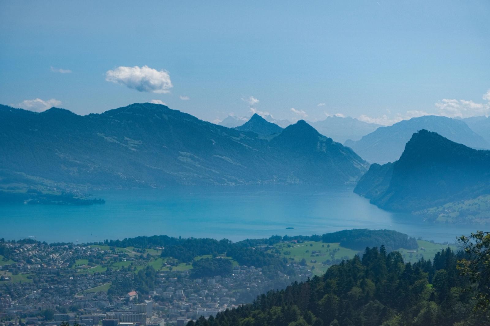 Stunning aerial view of Lake Lucerne against majestic mountain backdrop in Alpnach, Switzerland