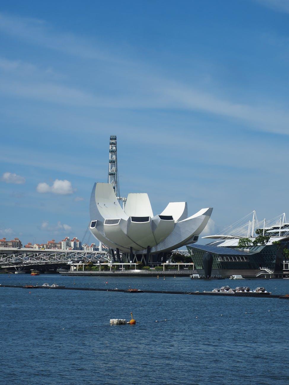 Stunning view of the ArtScience Museum near Marina Bay against a clear blue sky