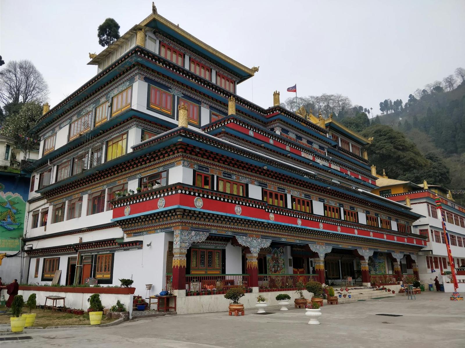 Beautiful Dali Monastery exterior in foggy Darjeeling, India with vibrant architecture