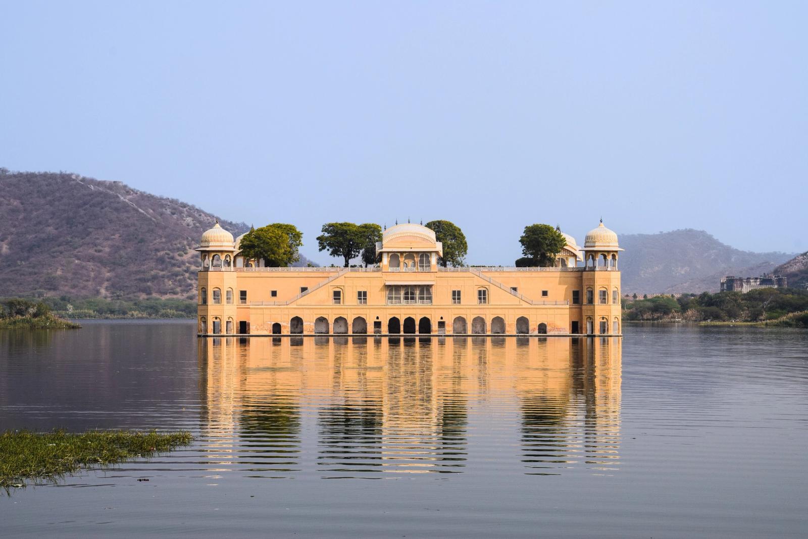 Scenic view of Jal Mahal Palace in Jaipur reflecting in the calm waters of Man Sagar Lake