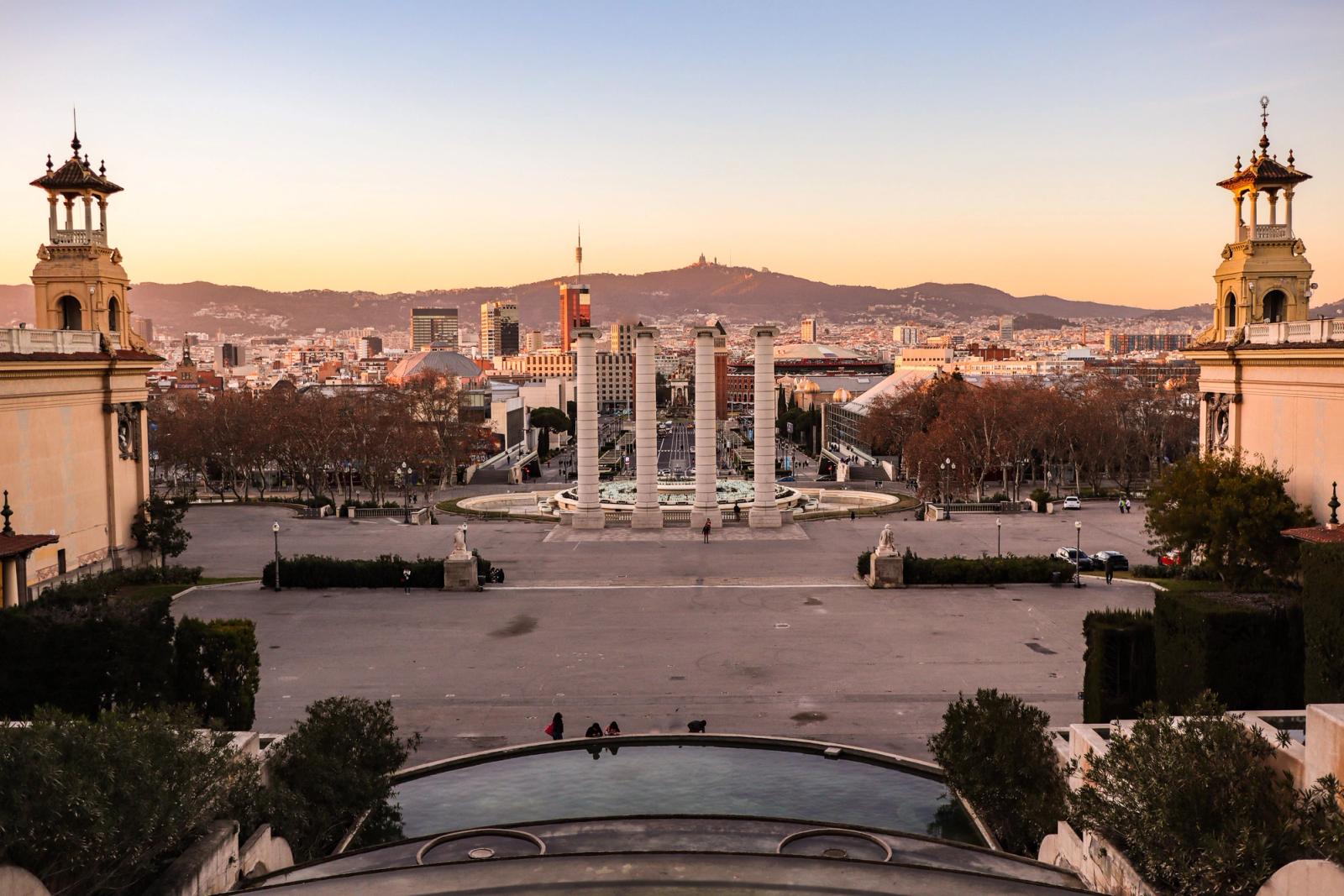Beautiful sunset view of Barcelona cityscape from Montjuïc with historical architecture and vibrant city vibes