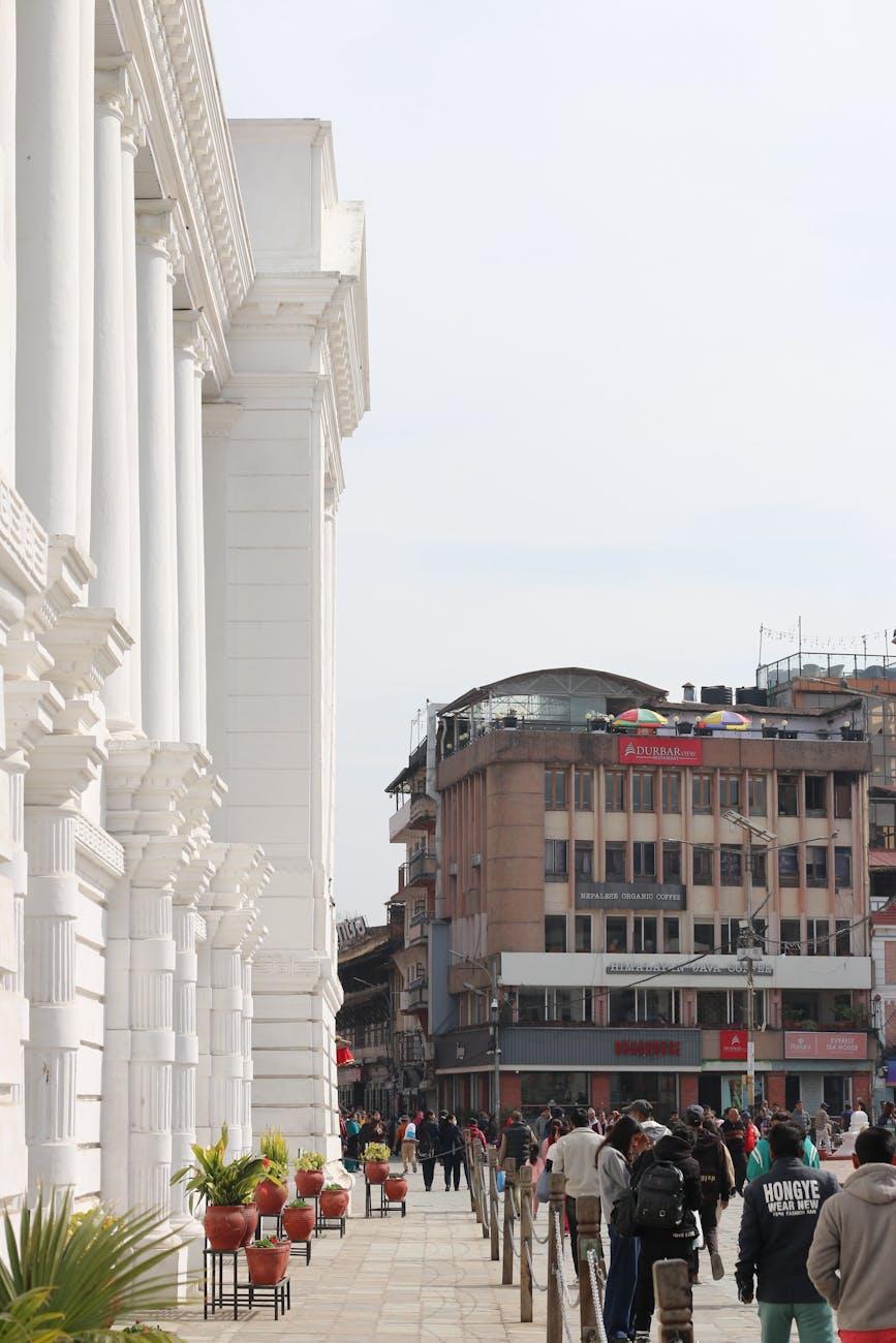Street view in Kathmandu with historic architecture and lively crowd