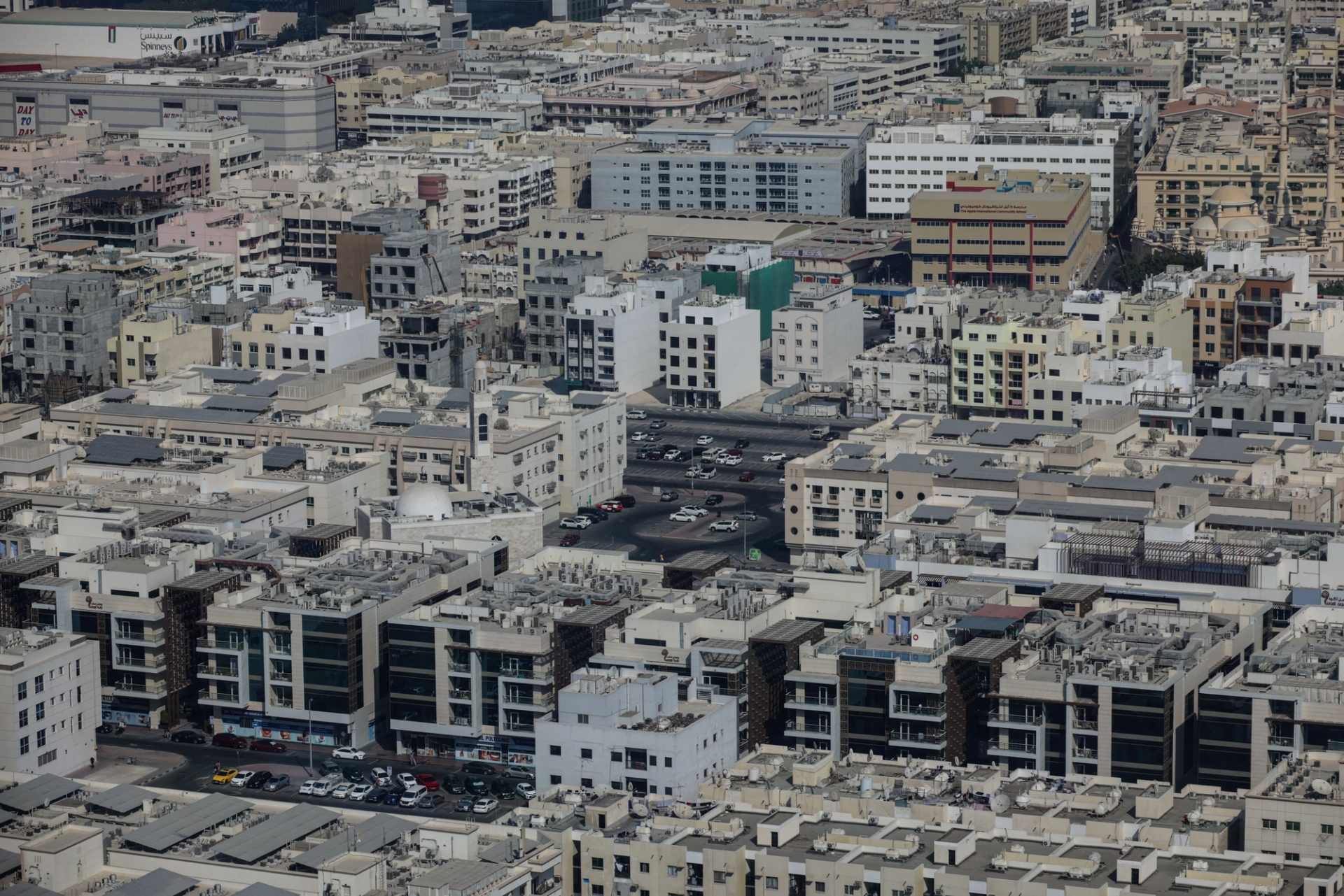 Explore the rich architectural landscape of Old Dubai from an aerial perspective