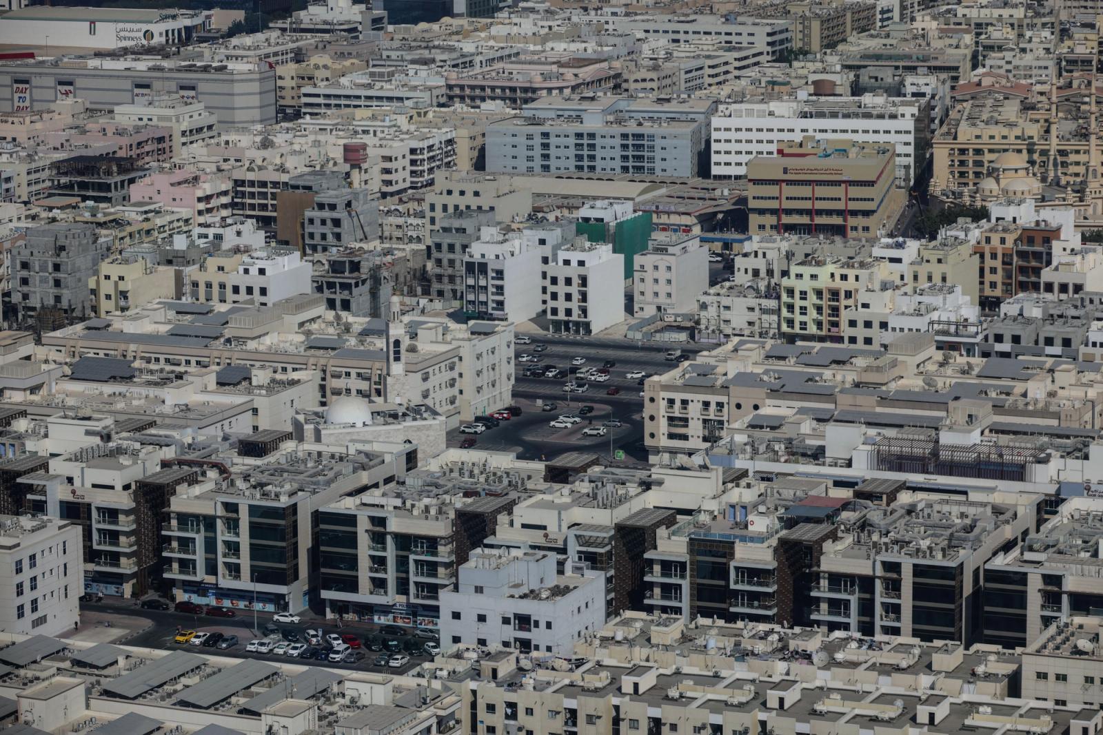 Explore the rich architectural landscape of Old Dubai from an aerial perspective