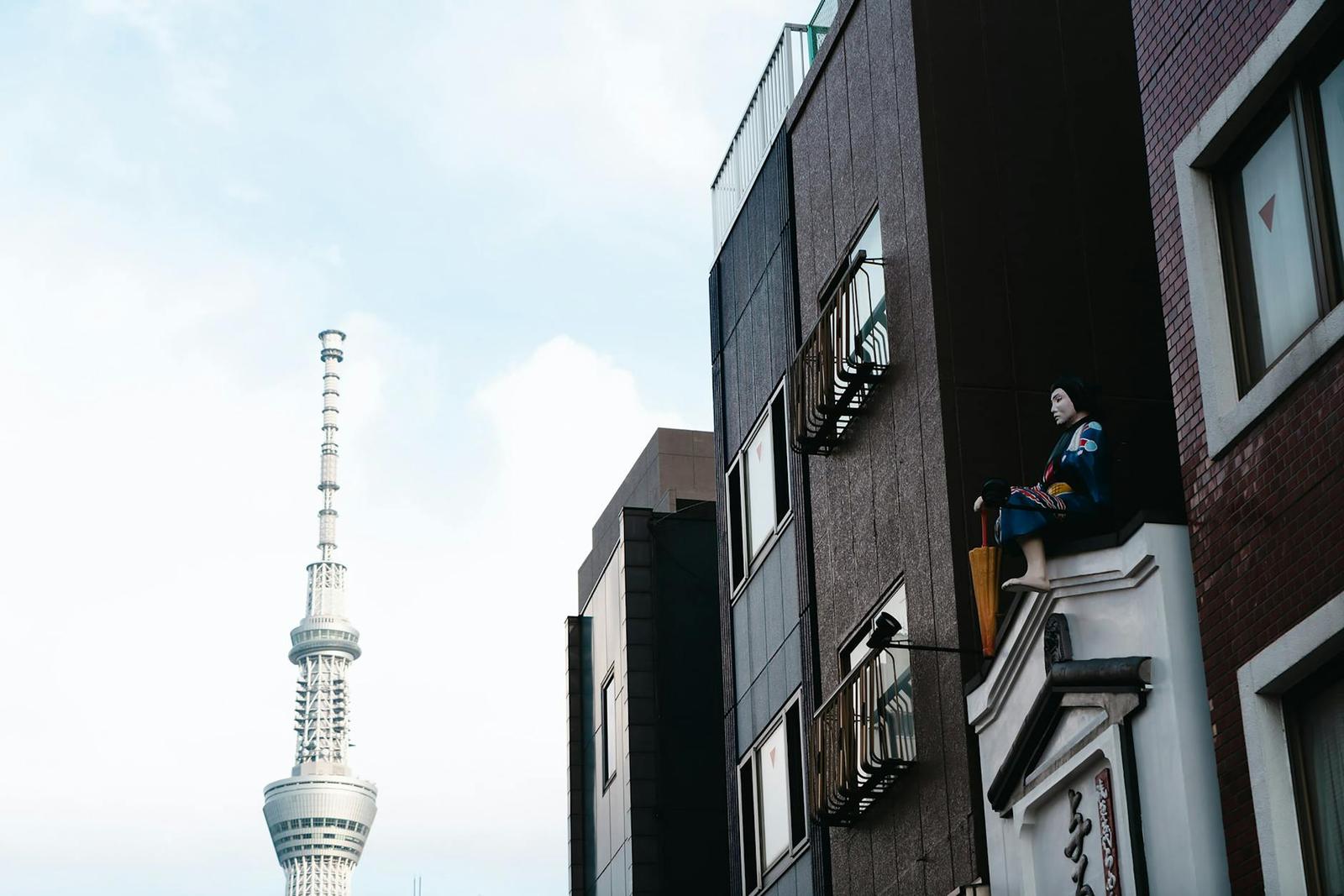View of Tokyo Skytree beside traditional urban architecture in Tokyo, Japan
