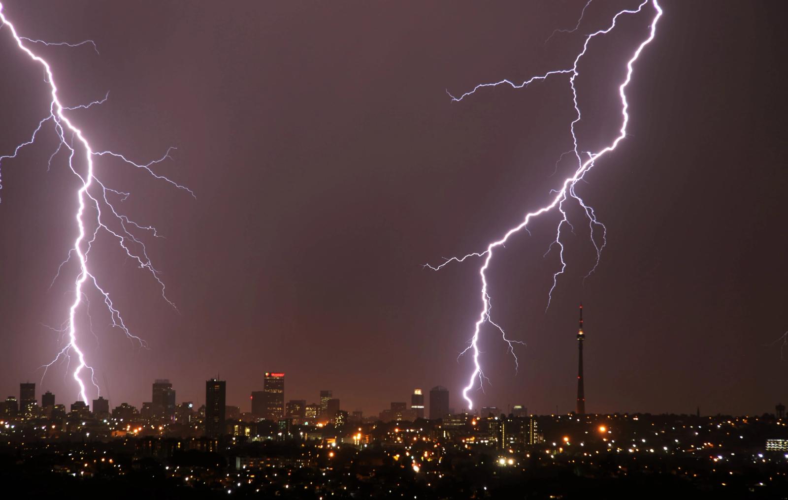 Captivating lightning strikes illuminate the Johannesburg skyline in a nighttime storm