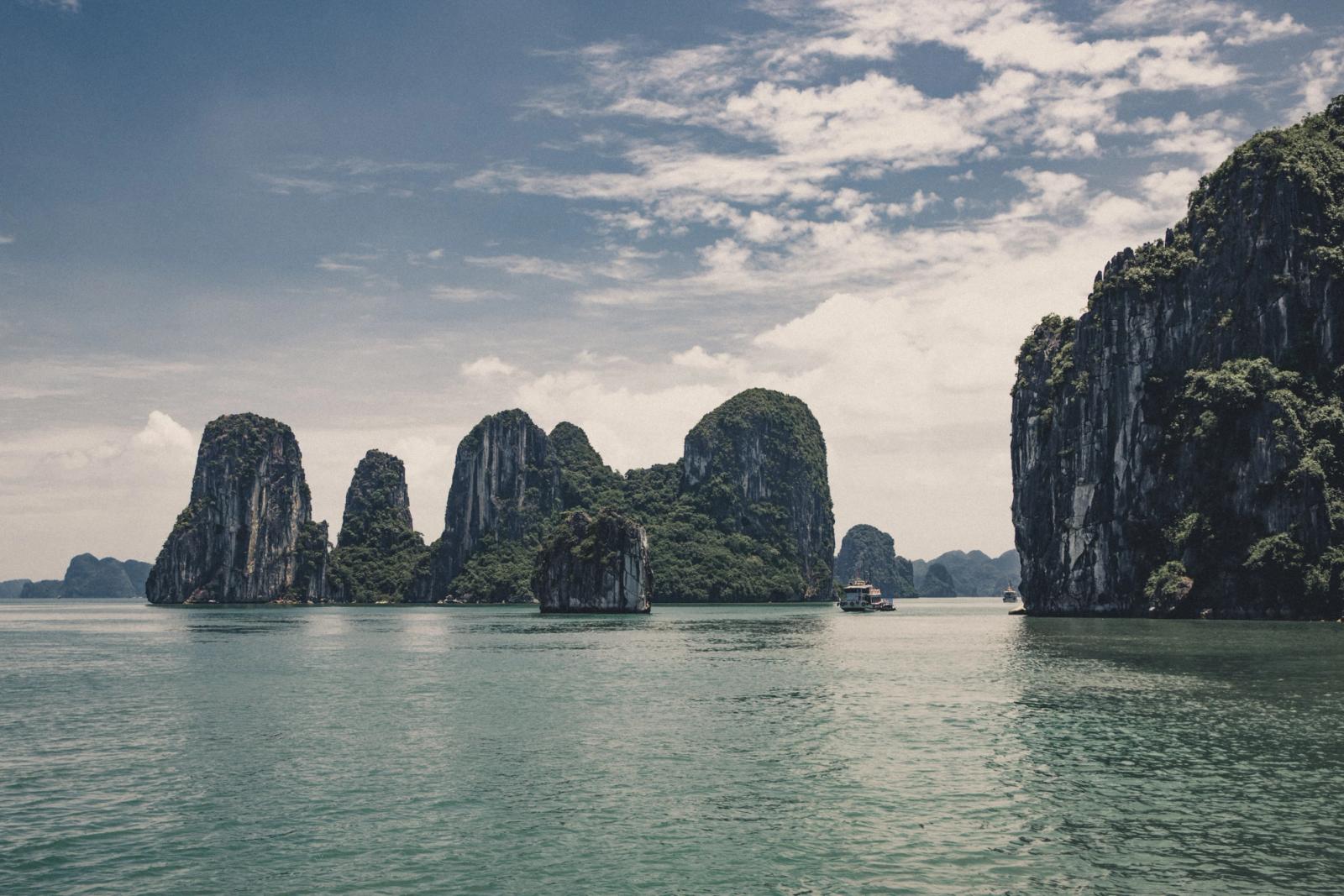 Explore the breathtaking limestone formations of Ha Long Bay, a UNESCO World Heritage site in Vietnam