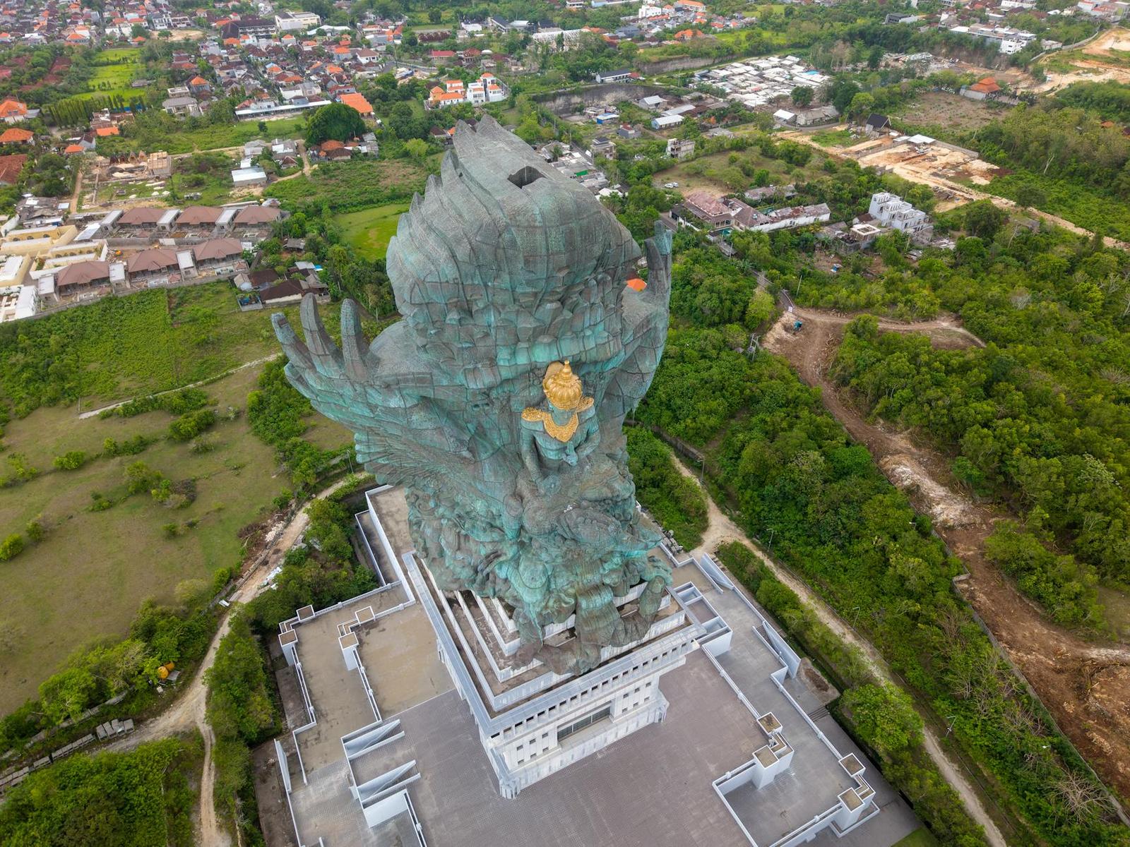 Stunning aerial view of Garuda Wisnu Kencana statue and surrounding landscape in Bali, Indonesia