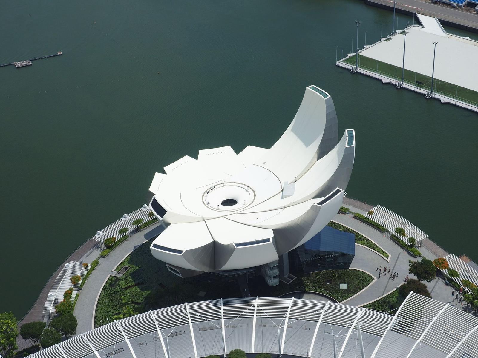 Aerial shot of the iconic ArtScience Museum beside Marina Bay in Singapore