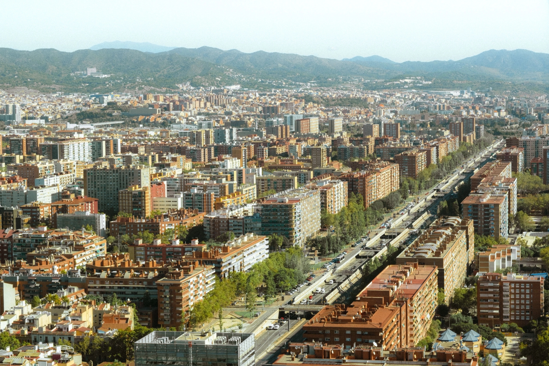 A breathtaking aerial shot of Barcelona showcasing urban architecture in daylight