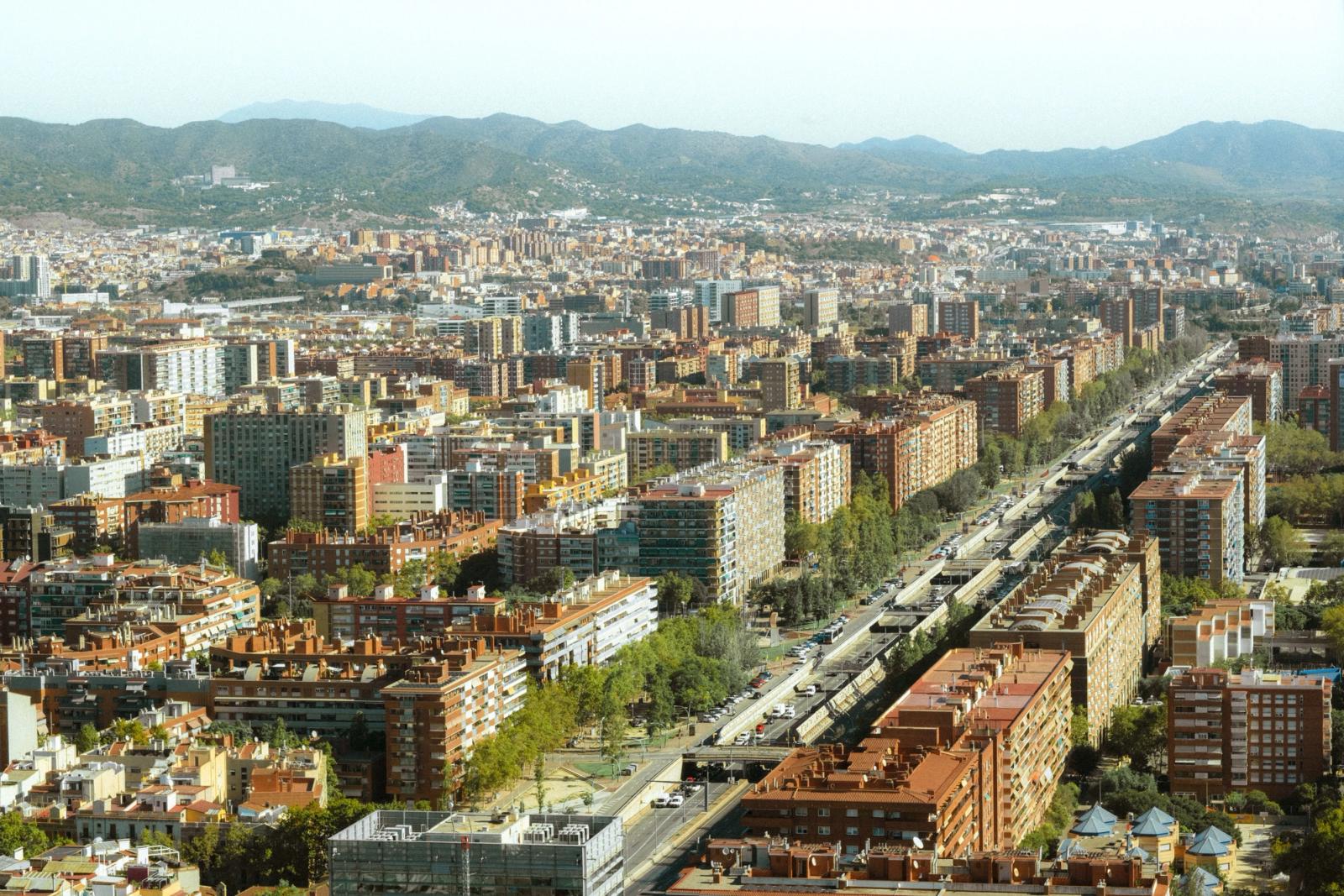 A breathtaking aerial shot of Barcelona showcasing urban architecture in daylight