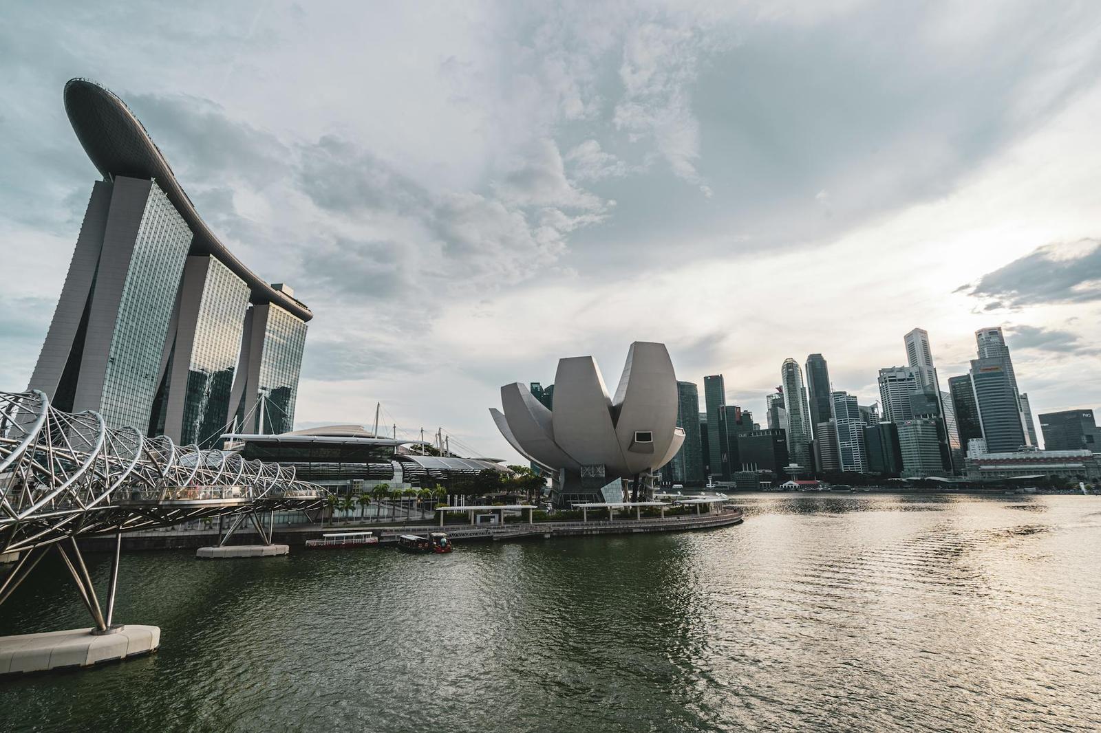 Breathtaking view of Singapore Marina Bay with iconic architecture and skyline during dusk