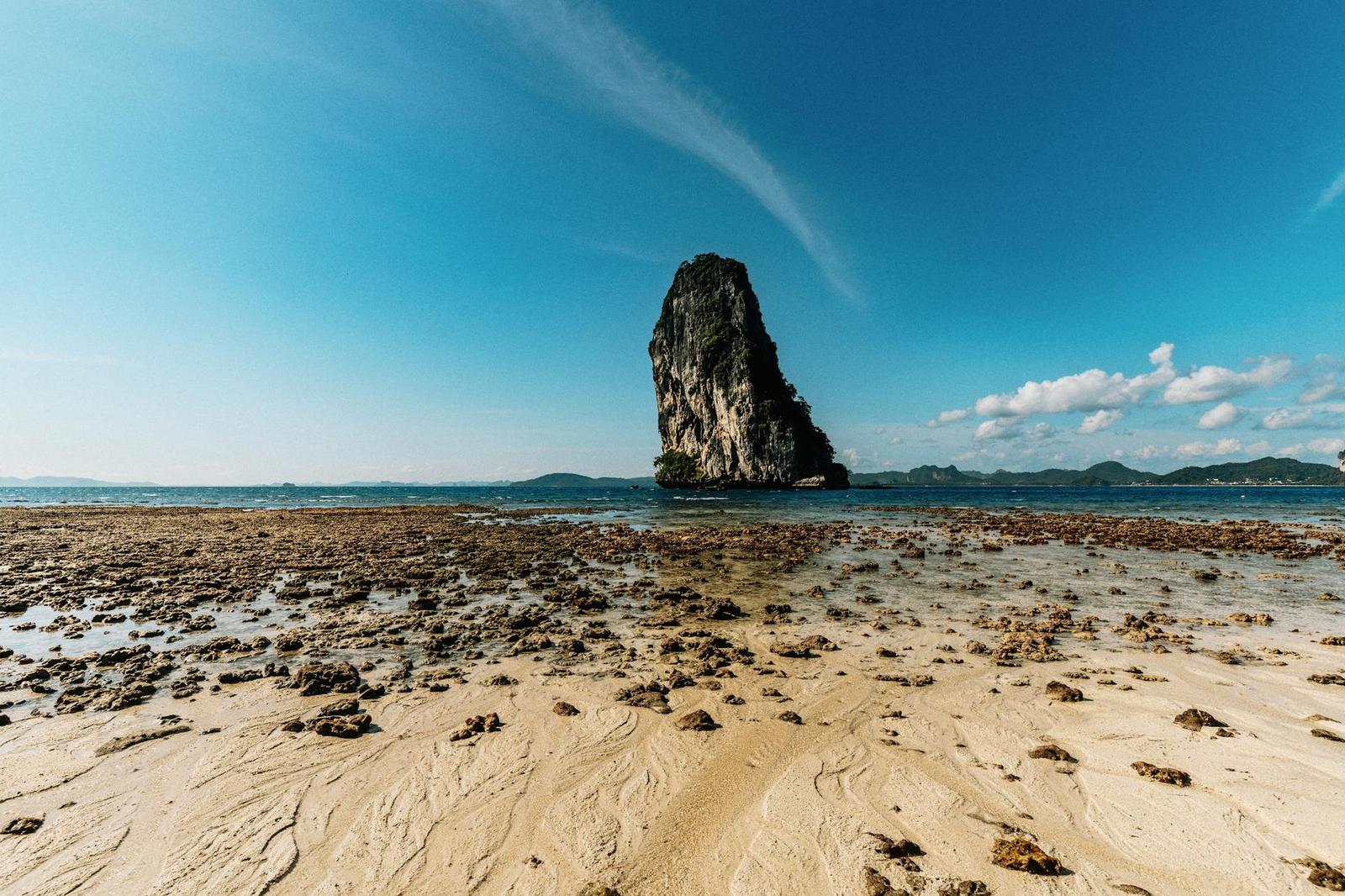 Stunning view of a unique rock formation rising from the sea in Phang Nga, Thailand