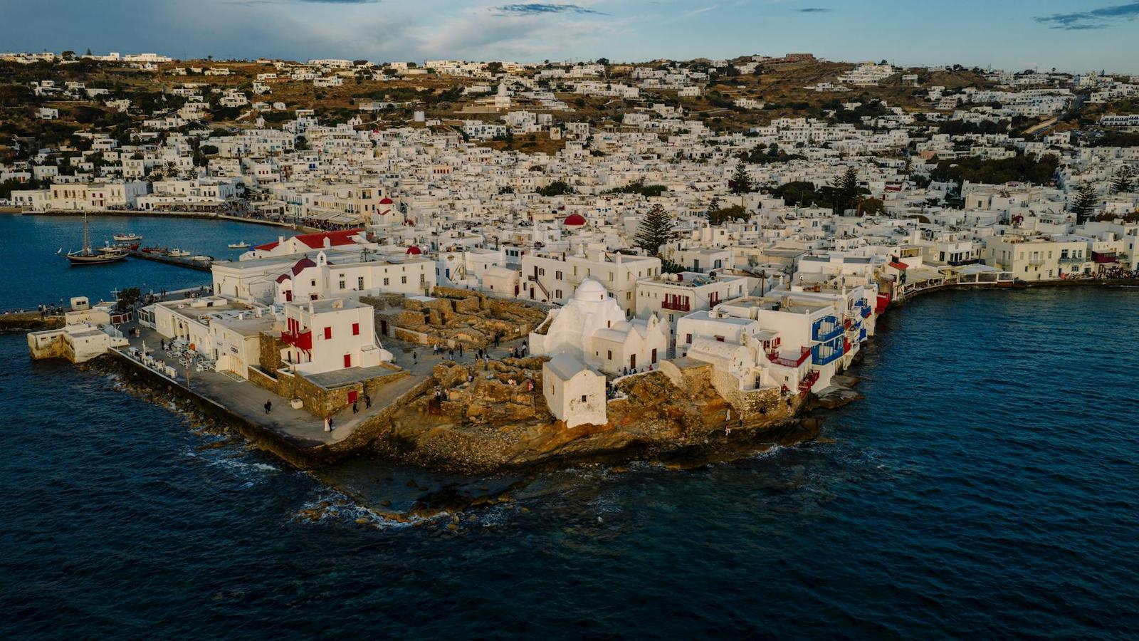 Stunning aerial view of Mykonos town with whitewashed buildings and blue sea