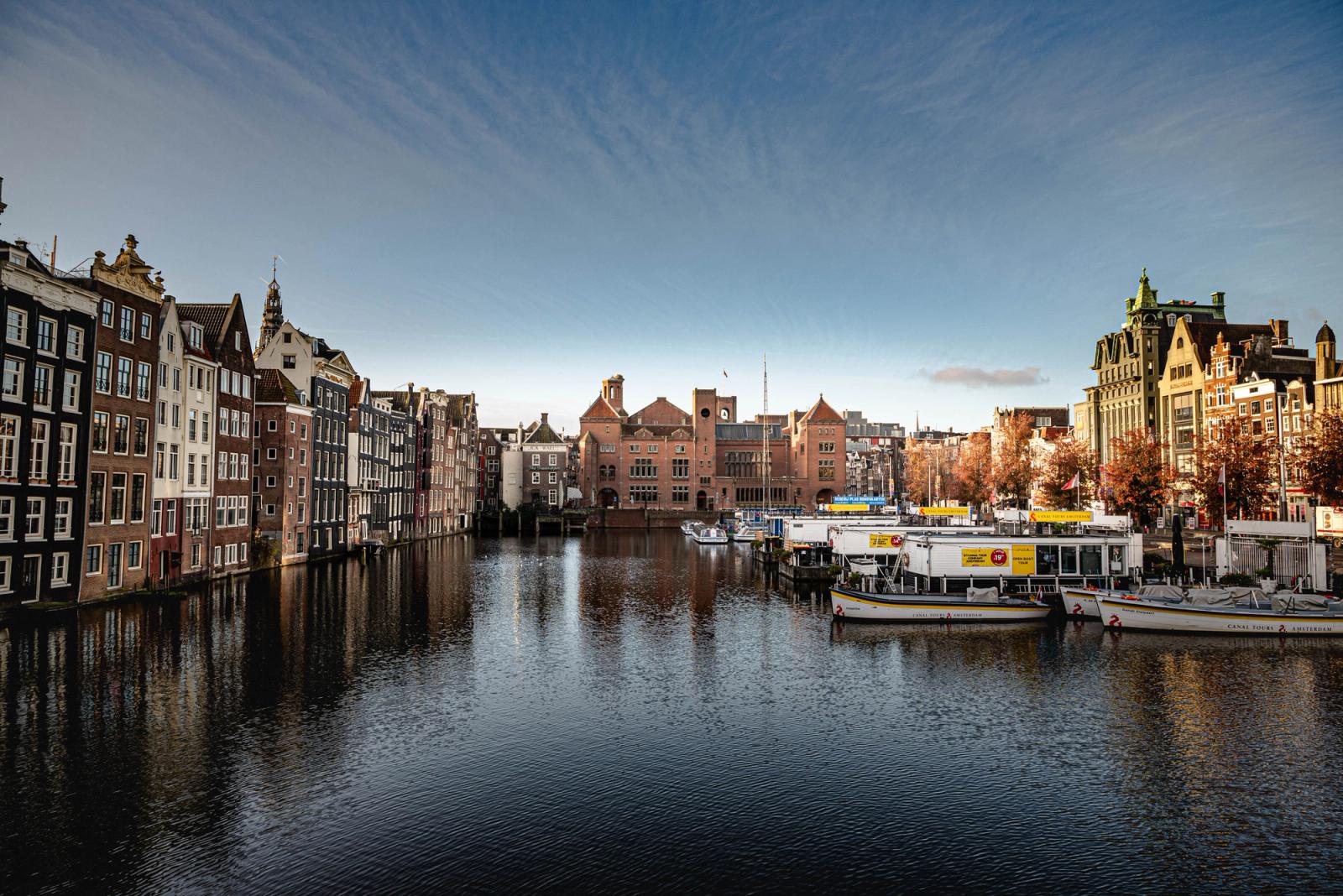 Charming canal view highlighting Amsterdam's historic architecture and picturesque setting