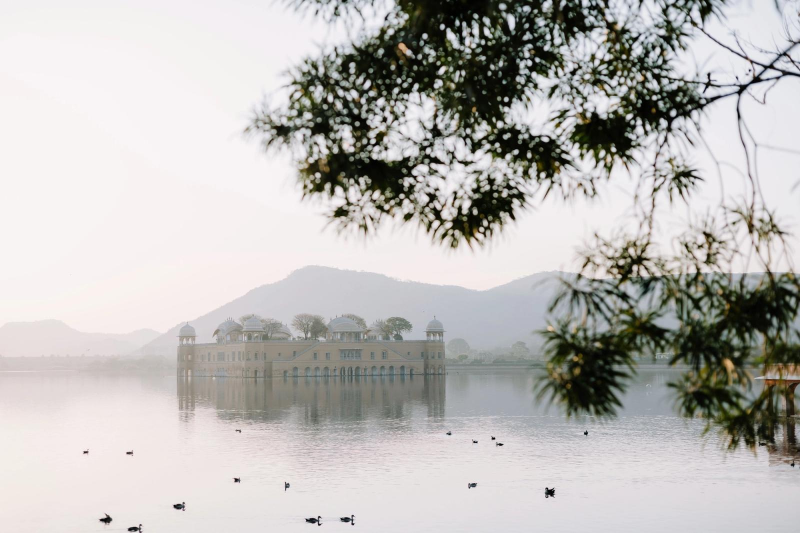 Beautiful view of Jal Mahal in Jaipur, Rajasthan, reflecting in the calm lake during sunrise