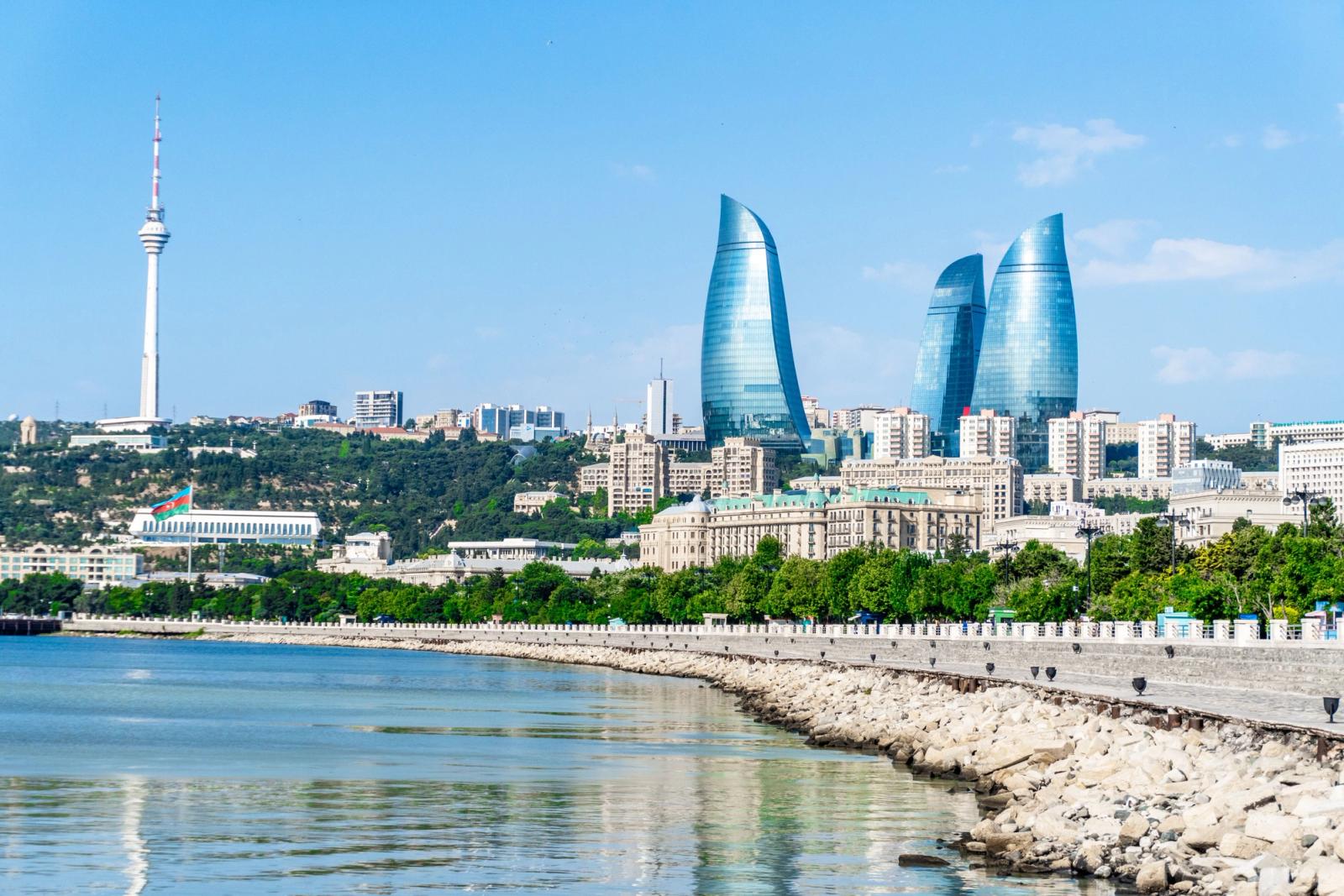 Stunning view of Baku's modern skyline including the iconic Flame Towers and Caspian Sea waterfront