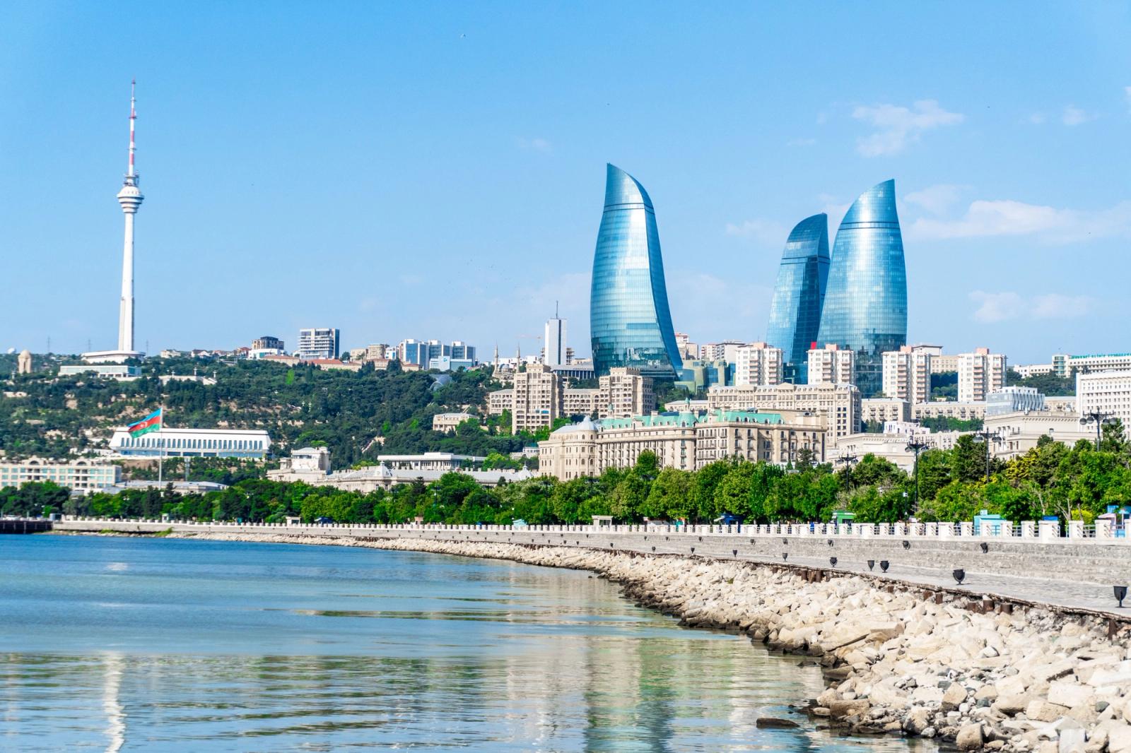 Stunning view of Baku's modern skyline including the iconic Flame Towers and Caspian Sea waterfront