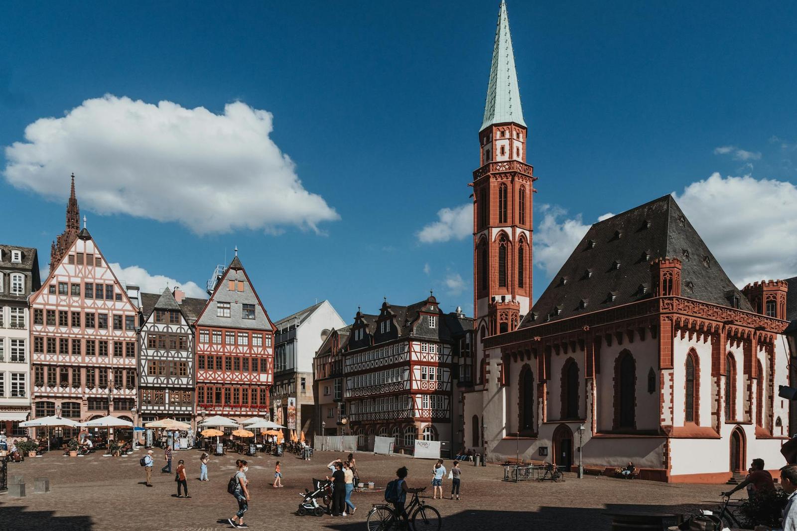 Picturesque Römerplatz in Frankfurt with historic buildings and St. Nicholas Church