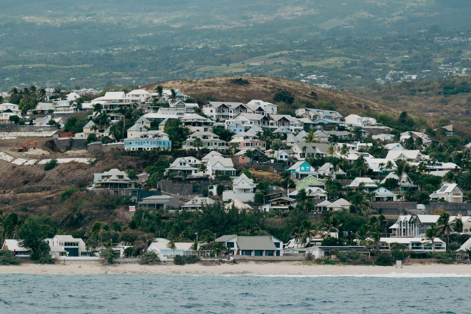 Hillside houses above the shoreline on Réunion’s west coast