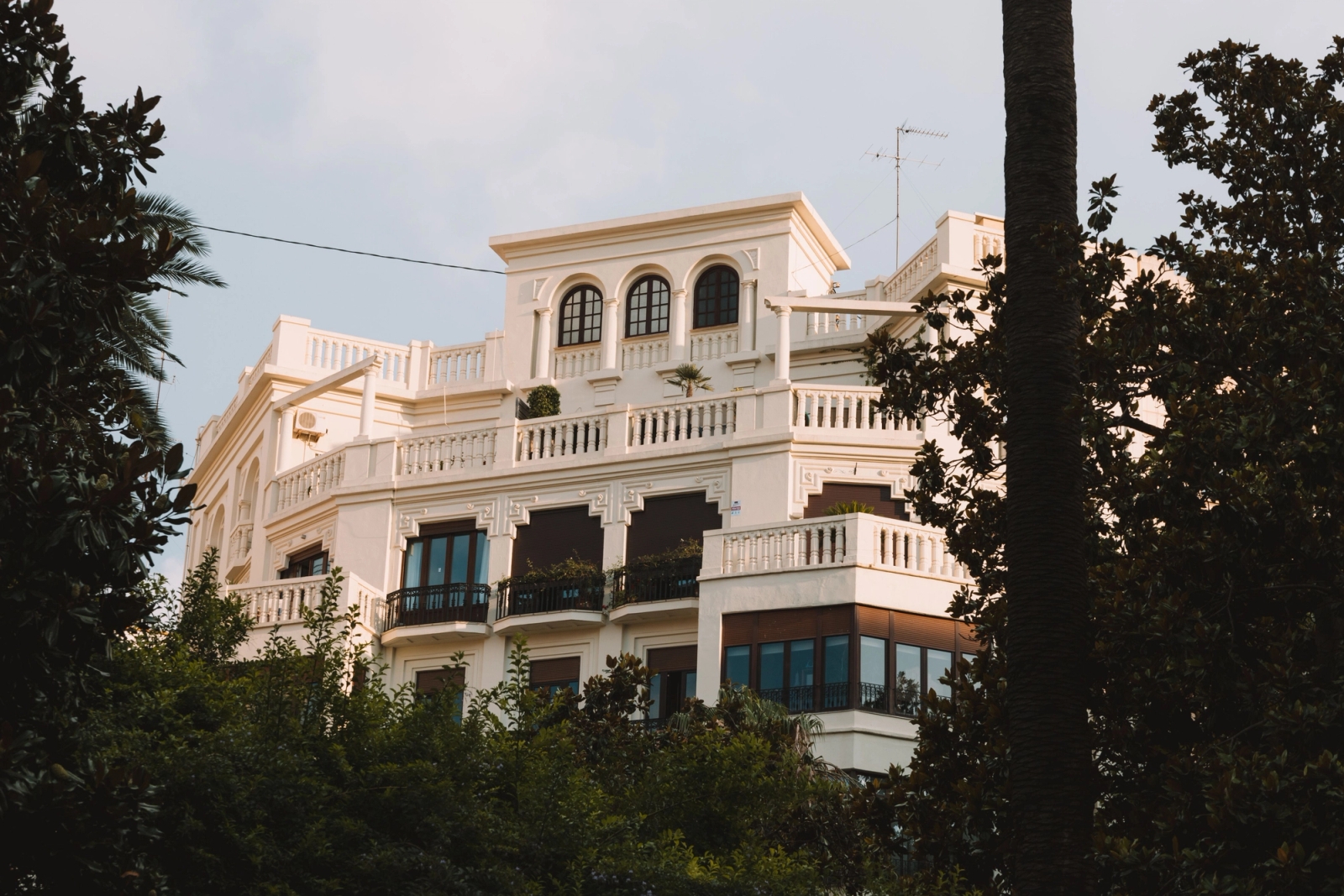 A stunning villa in Valencia, Spain, surrounded by greenery and showcasing classic architecture