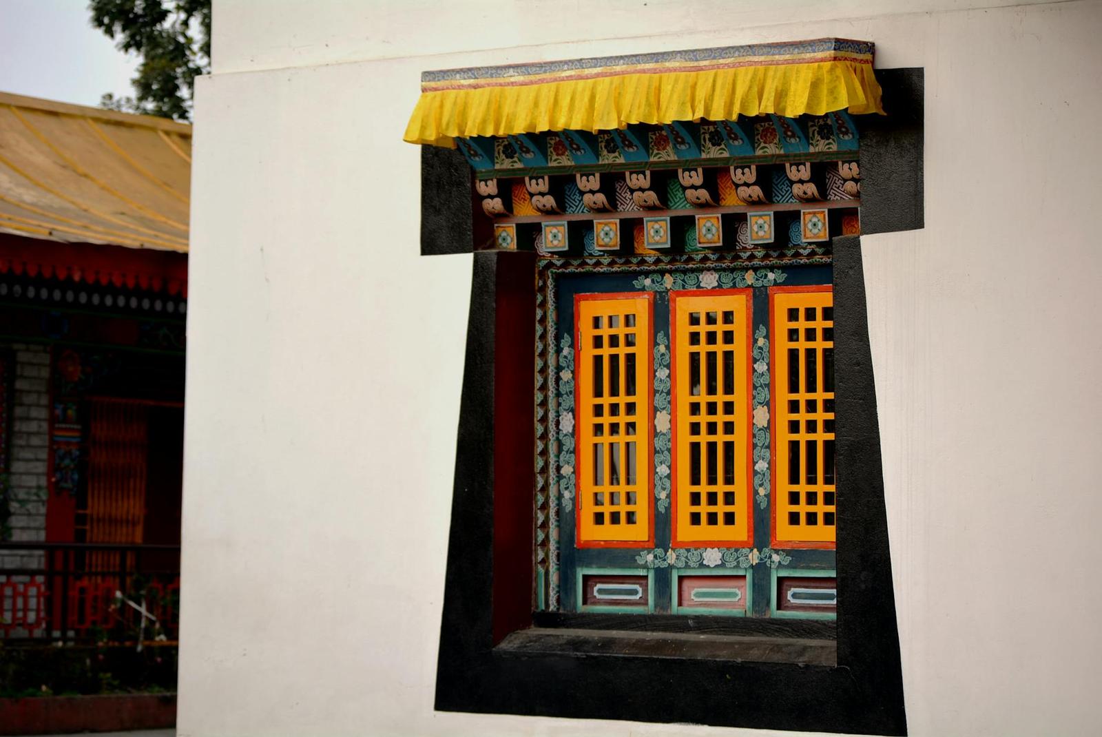 Colorful traditional Buddhist window in Gangtok, Sikkim
