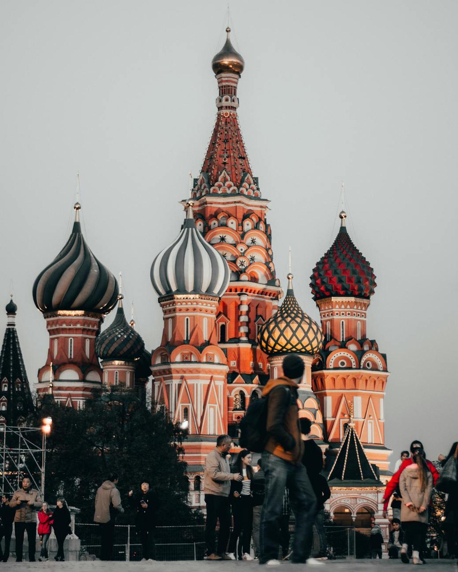 Capture of St. Basil's Cathedral with people in Moscow, Russia at dusk