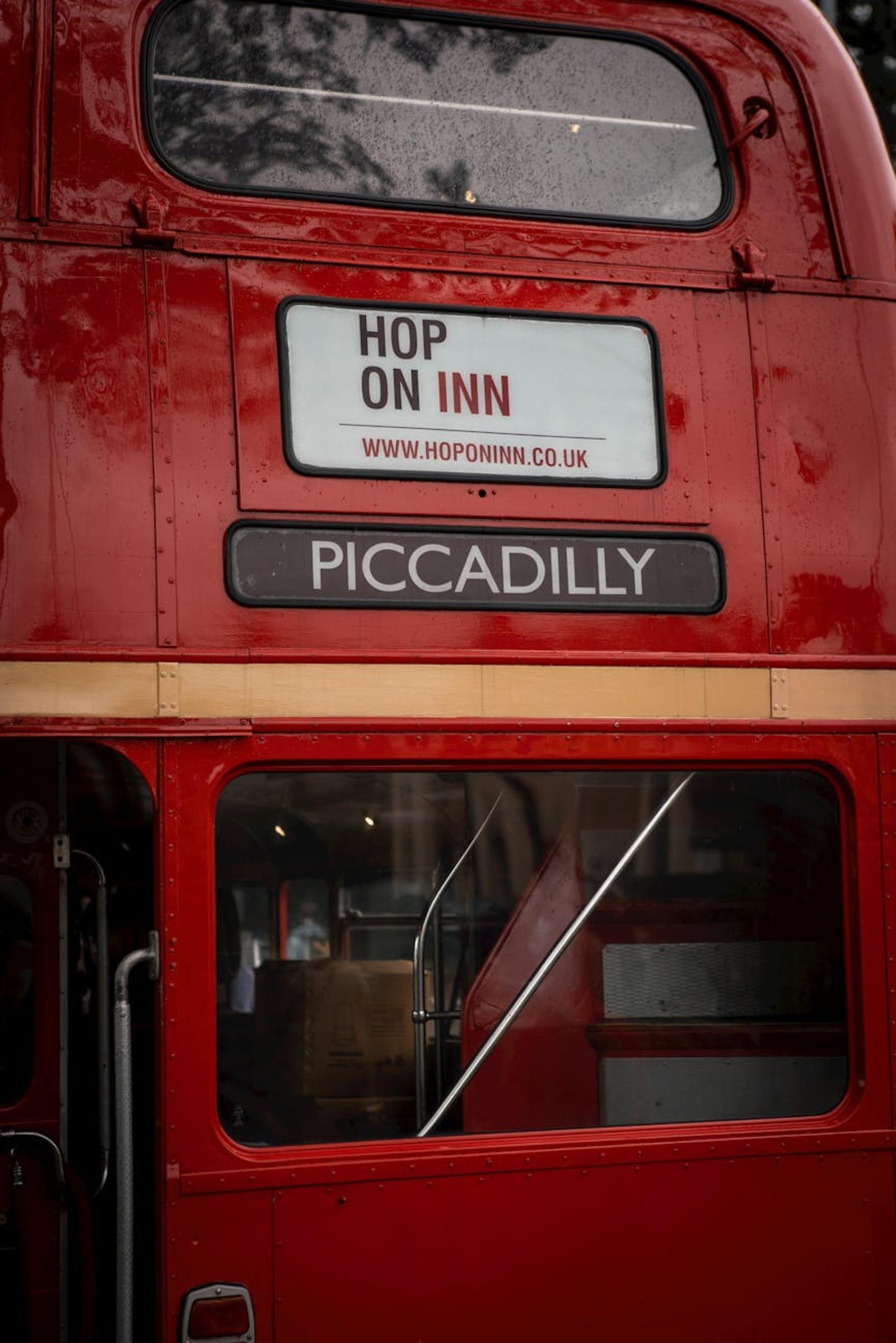 Close view of a red double-decker bus destination sign for Piccadilly