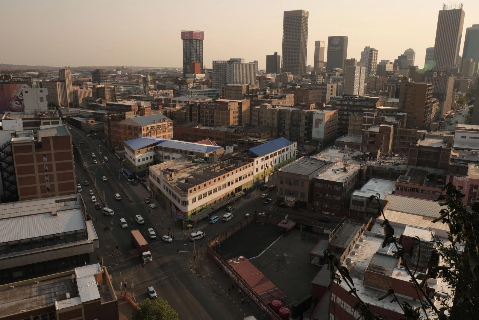 Scenic aerial view of Johannesburg cityscape showcasing urban architecture in warm evening light