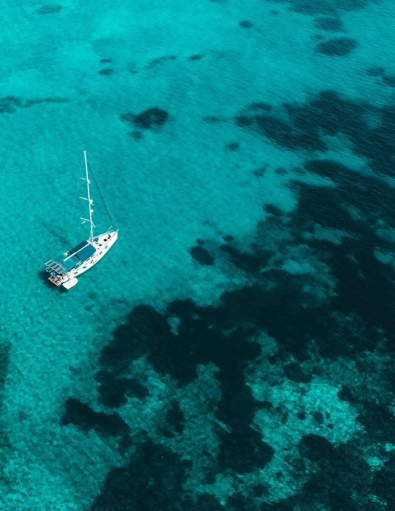 A sailing boat on a tropical lagoon