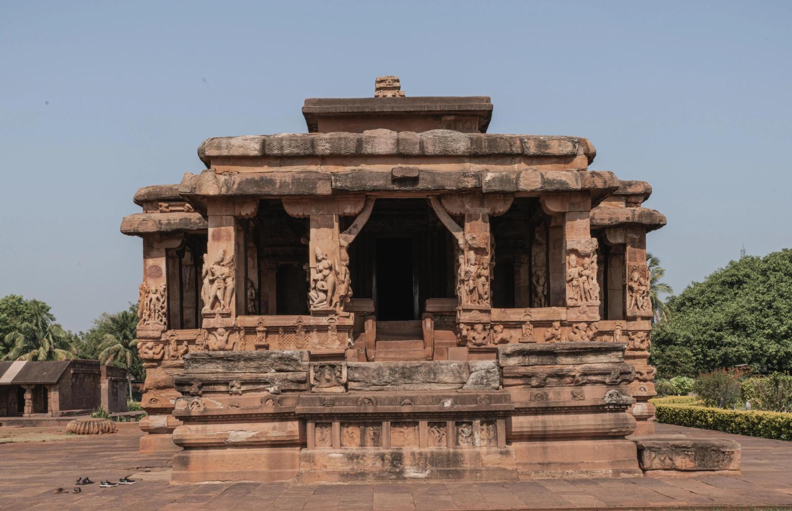 Explore the intricate carvings of the Durga Temple, an ancient architectural marvel in Aihole, Karnataka, India