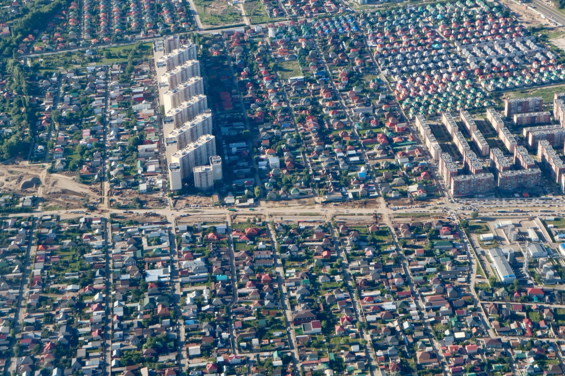 Aerial shot showcasing the diverse suburban architecture of Almaty, Kazakhstan
