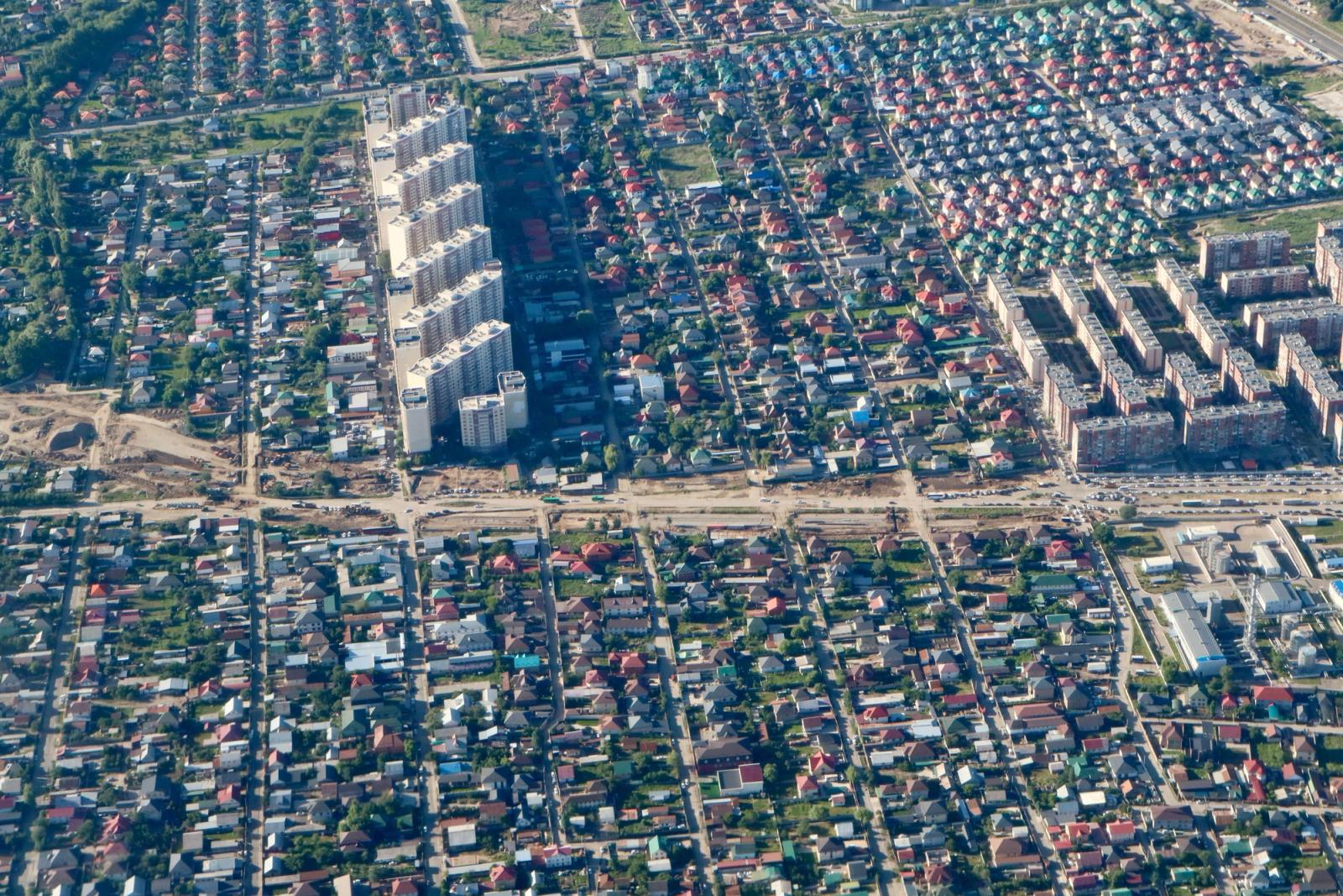 Aerial shot showcasing the diverse suburban architecture of Almaty, Kazakhstan
