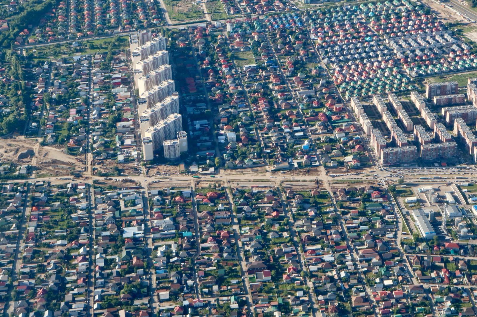 Aerial shot showcasing the diverse suburban architecture of Almaty, Kazakhstan