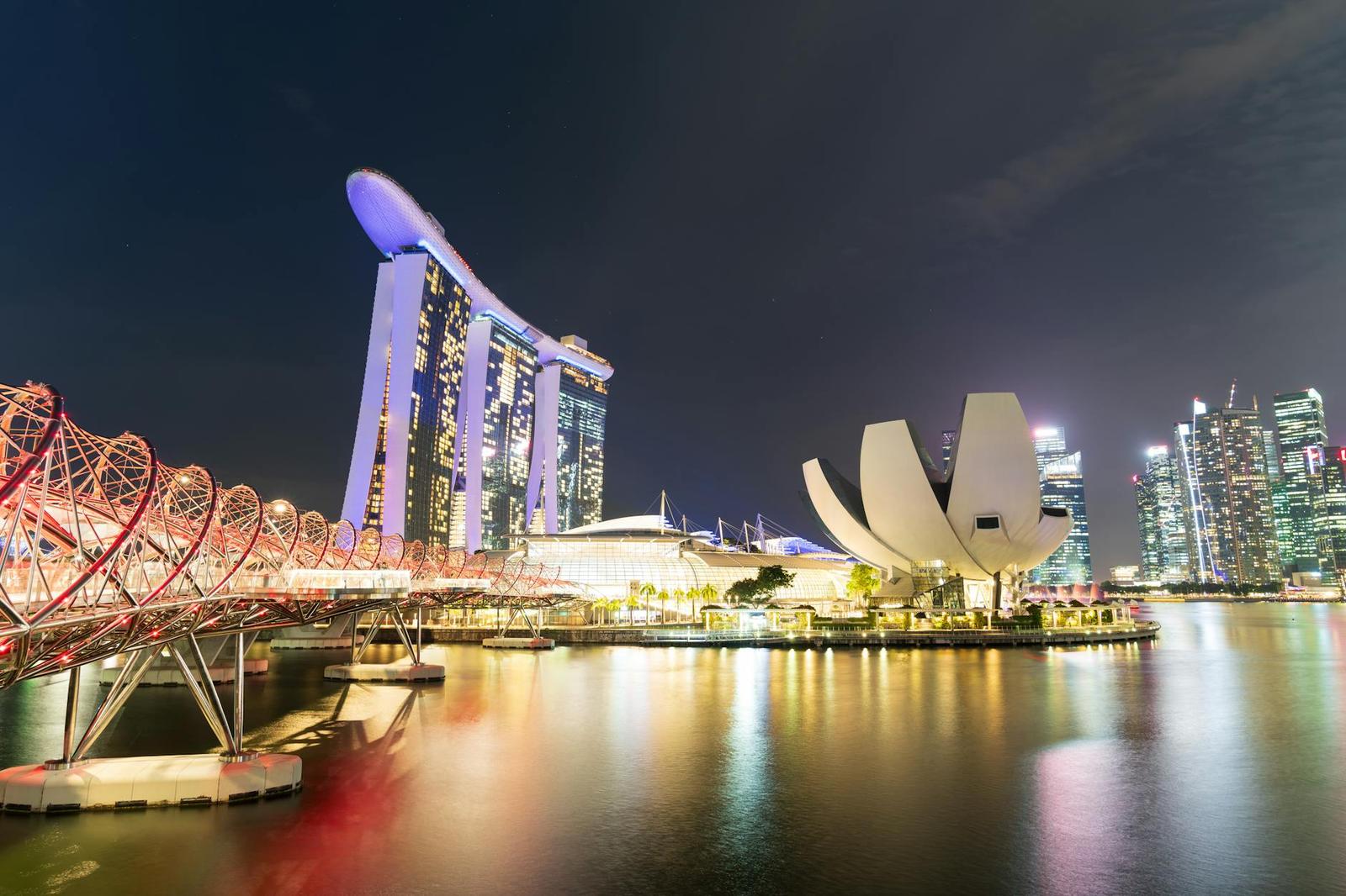 Vibrant night view of Marina Bay Sands and ArtScience Museum in Singapore's skyline