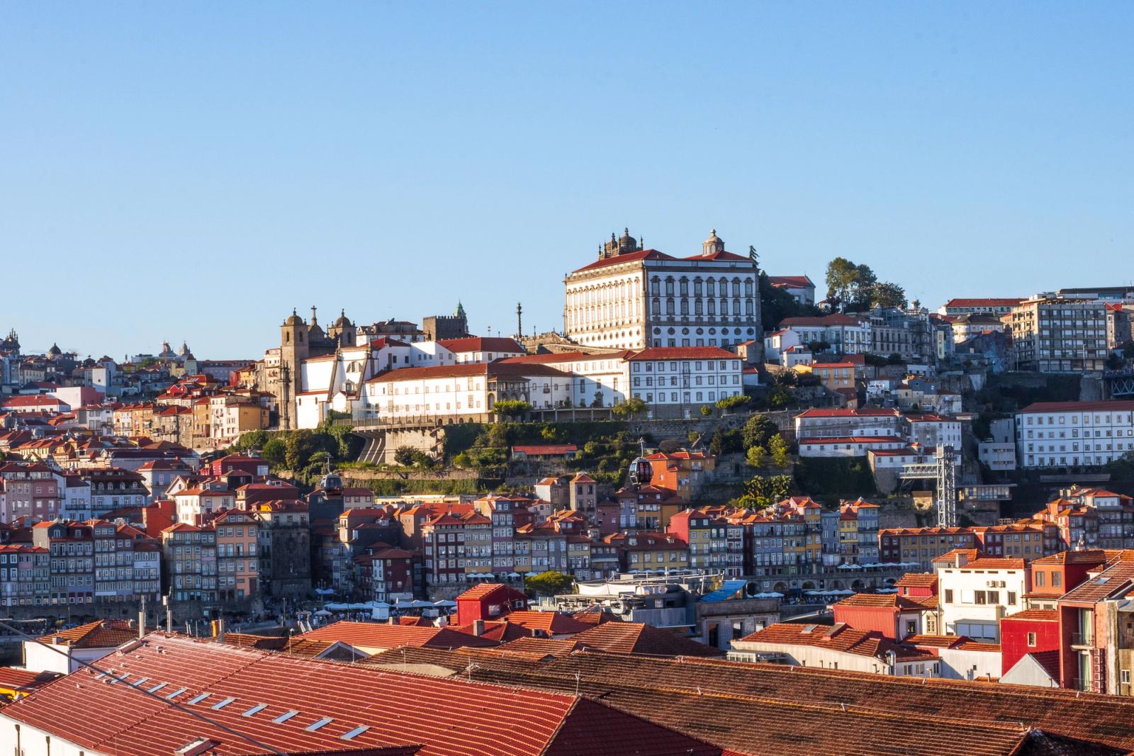Beautiful aerial view of Porto, Portugal showcasing historic buildings and red rooftops