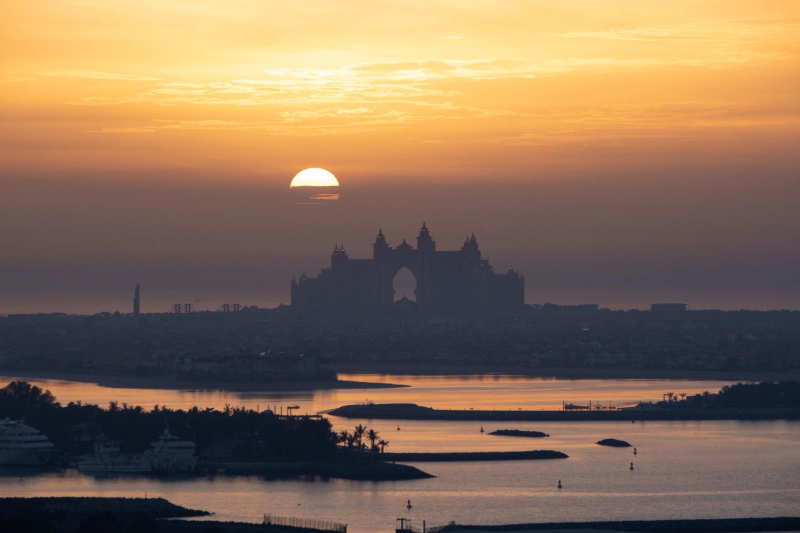 Captivating sunset view over Atlantis, The Palm in Dubai with serene waters