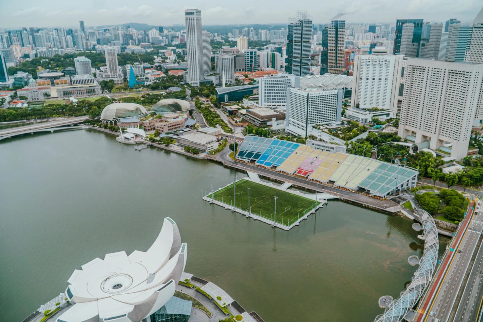 Stunning aerial shot of Marina Bay Sands and Singapore skyline, showcasing modern architecture