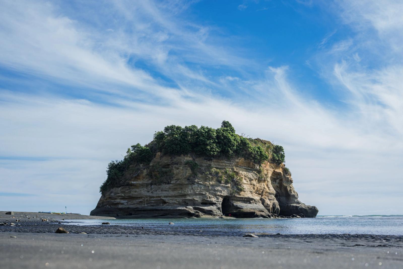 Stunning coastal view of Elephant Rock surrounded by sky and ocean in New Zealand