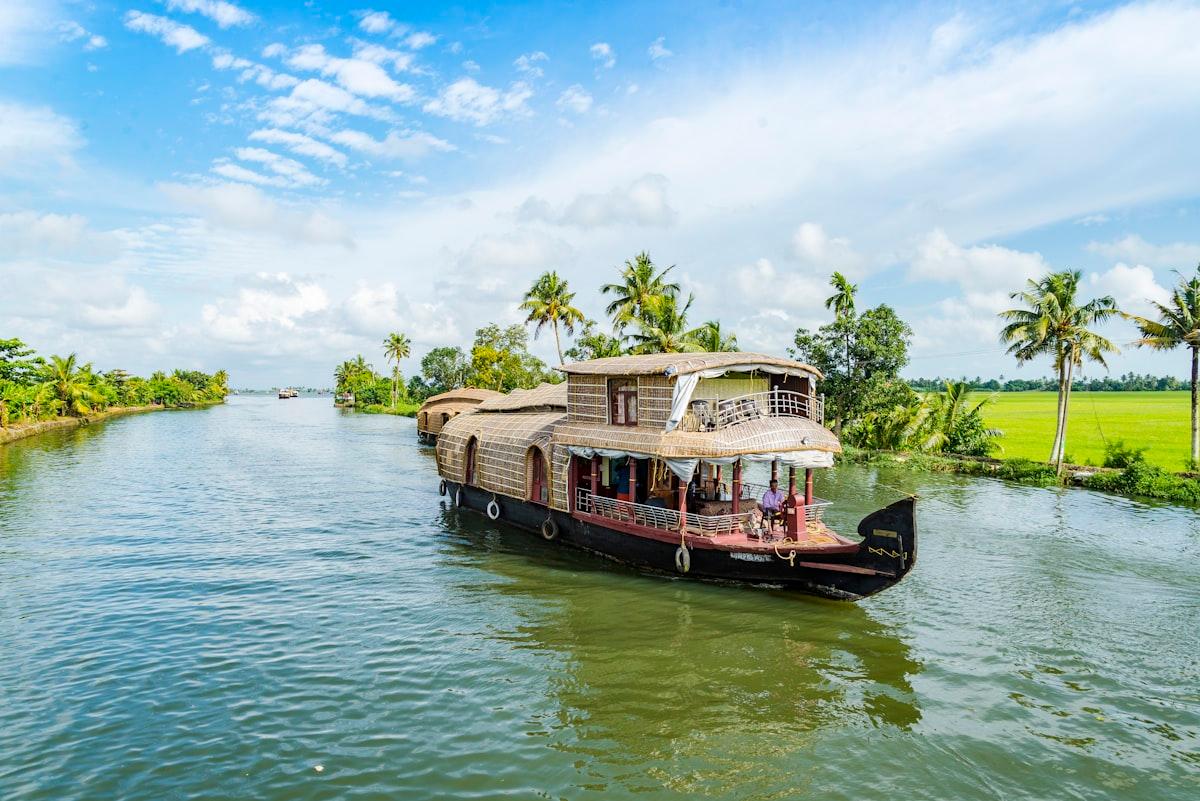 Kerala houseboats on the Alleppey backwaters at golden hour