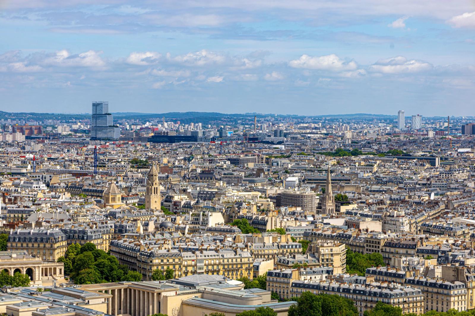 Stunning aerial view of Paris showcasing iconic architecture and city skyline