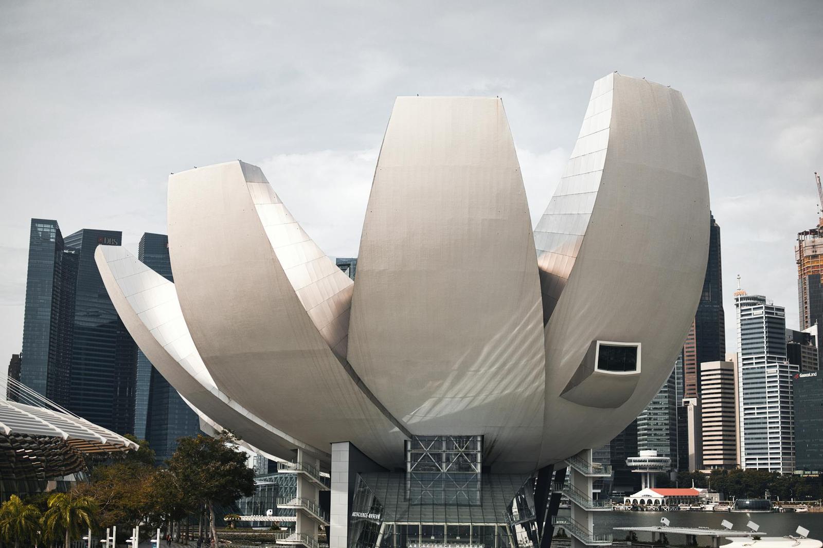 Iconic ArtScience Museum in Singapore with a backdrop of modern skyscrapers