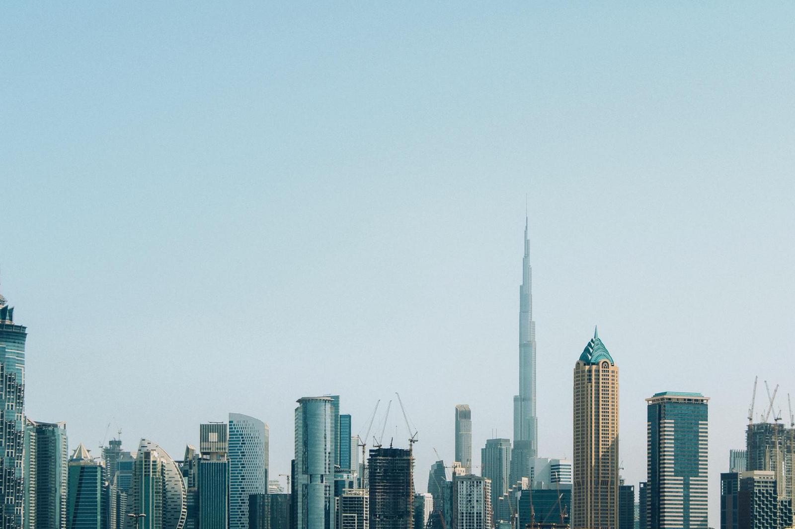 A stunning view of Dubai's skyline with the Burj Khalifa towering above modern skyscrapers