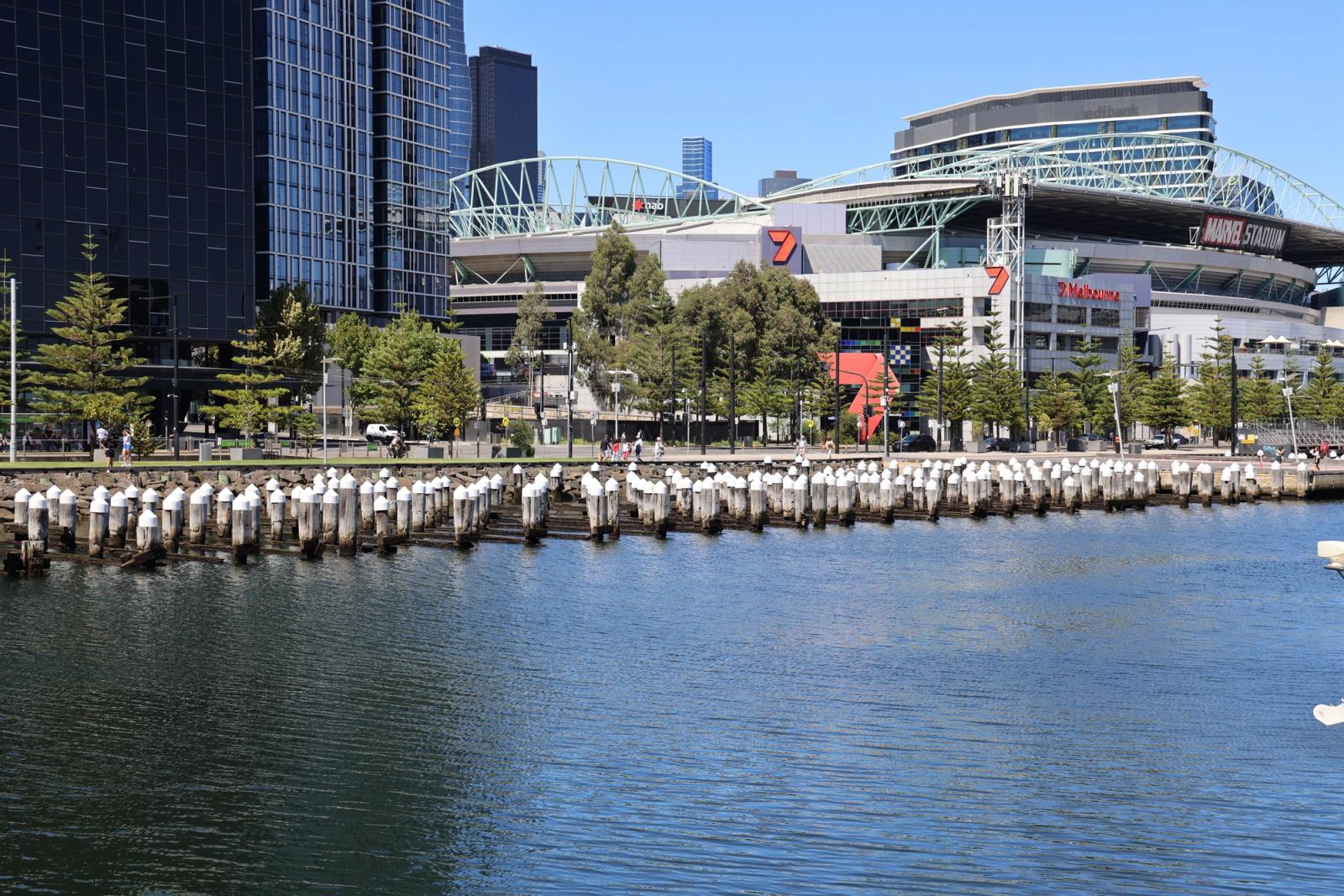 A sunny view of Marvel Stadium and the waterfront at Docklands, Melbourne, Australia