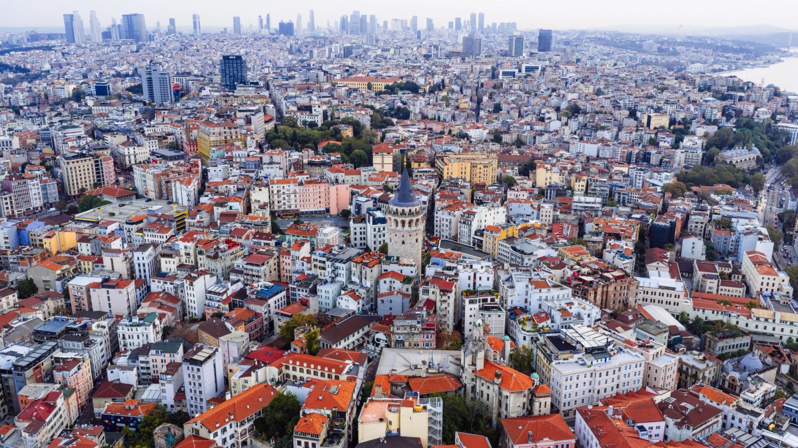 Stunning aerial shot of Istanbul featuring the iconic Galata Tower amidst the city's sprawling skyline