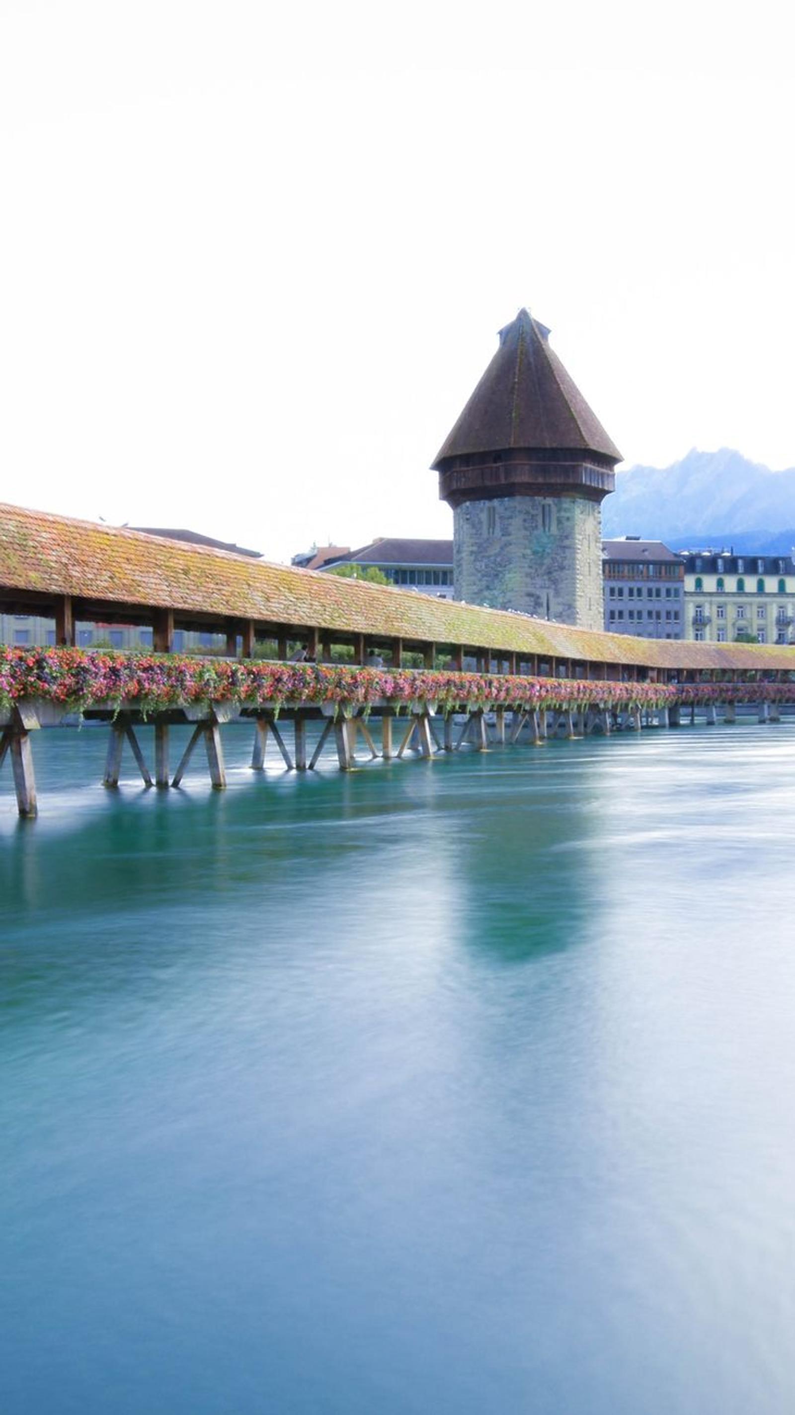 Scenic view of Chapel Bridge and Water Tower over the Reuss River in Lucerne, Switzerland