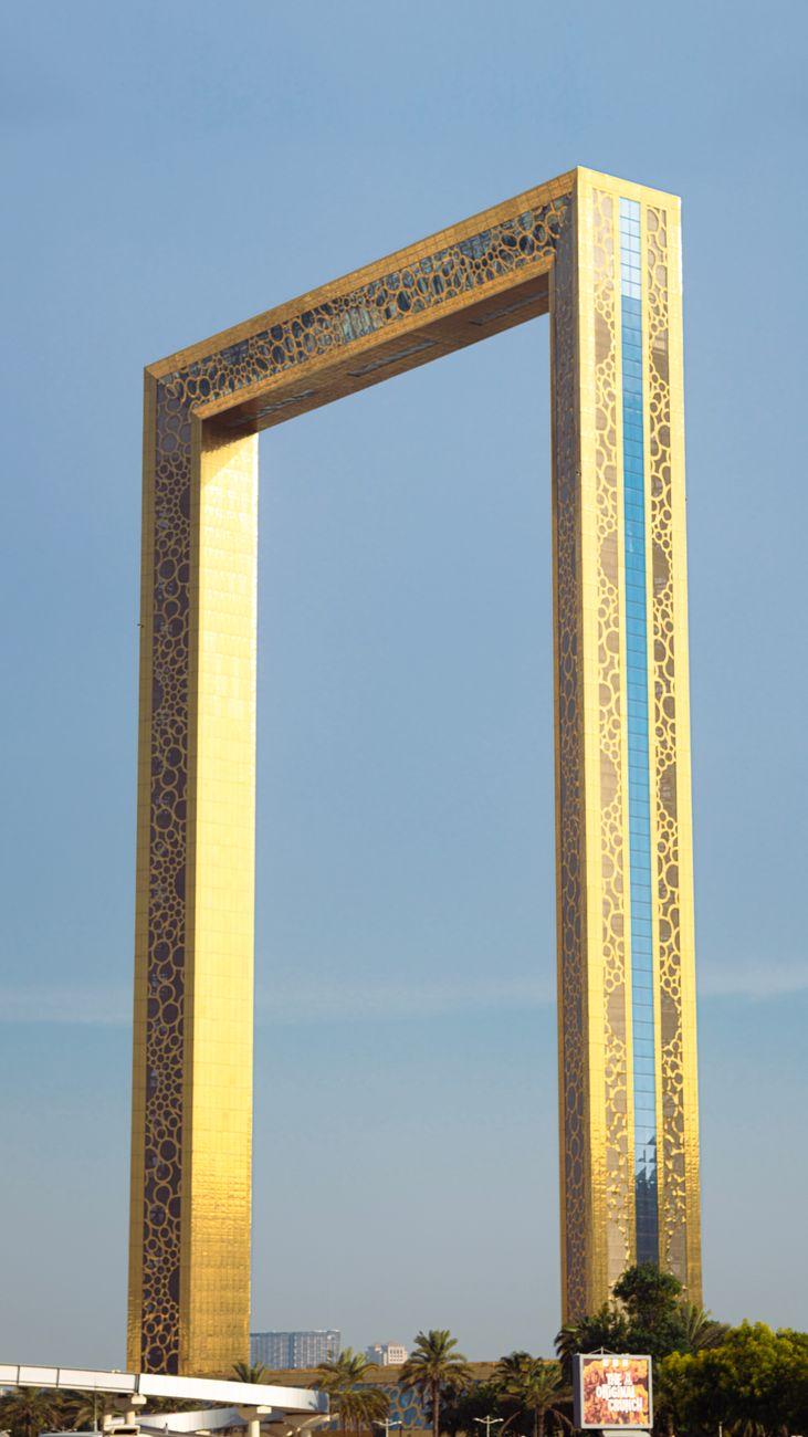 Iconic Dubai Frame monument standing tall against a clear blue sky in Zabeel Park, UAE