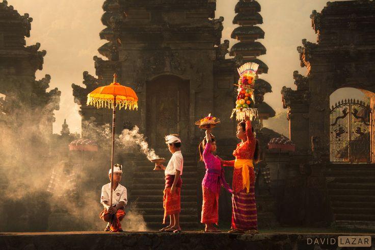 Lake temple set against Bali's misty highlands at dawn