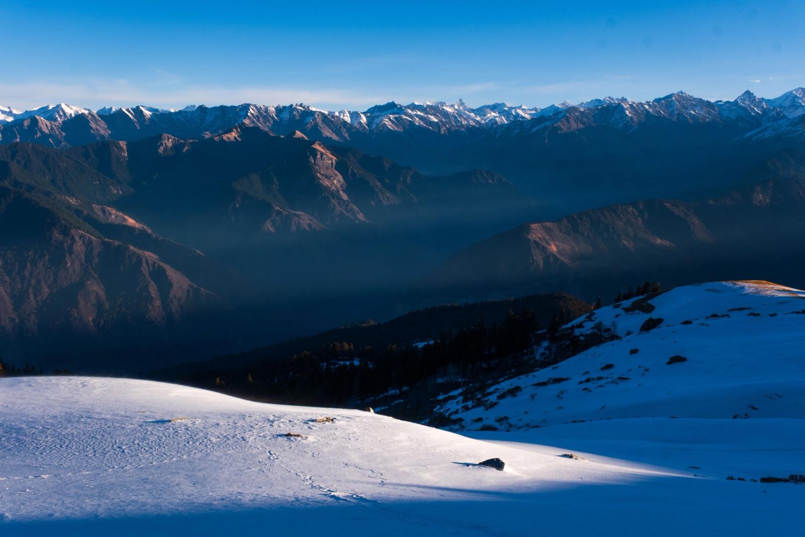 Stunning view of the snowcapped Himalayas from Singtur Range in Uttarakhand, India